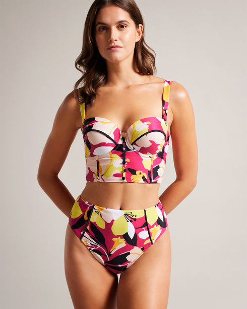MARTHYA-Swimwear-Make a splash this summer with our gorgeous MARTHYA bikini bottoms. Their vibrant floral print is perfectly complemented by contrasting piping. Wonderfully versatile, you can pair them with the matching top or mix and match for a look that's all your own.The fabric of this product is made with 78% recycled polyamide. Using recycled polyamide helps divert plastic waste from ending in landfills. Bikini bottoms High waisted Floral print Contrast piping Logo engraved hardware Matching top avail